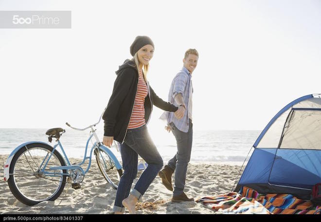 stock-photo-couple-walking-on-beach-holding-hands-83401337