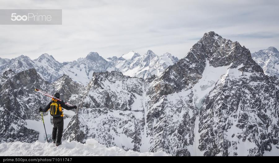 skier admiring the mountains