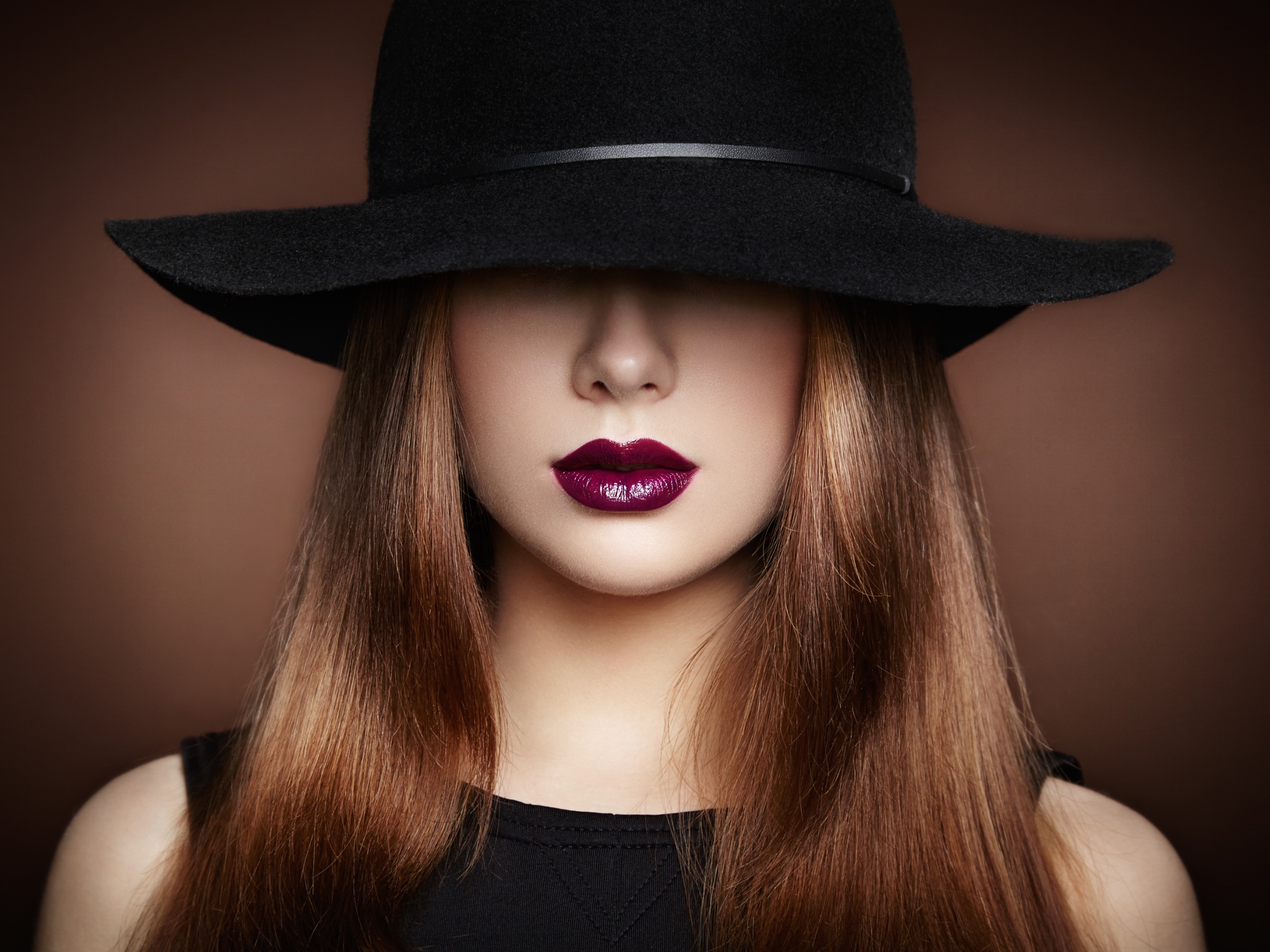 Fashion photo of young magnificent woman in hat. Girl posing