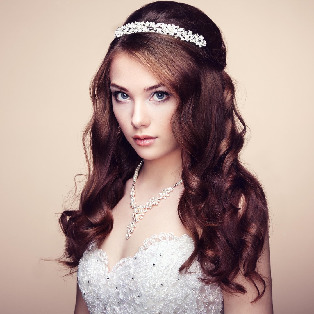 Portrait of beautiful sensual woman with elegant hairstyle. Wedd