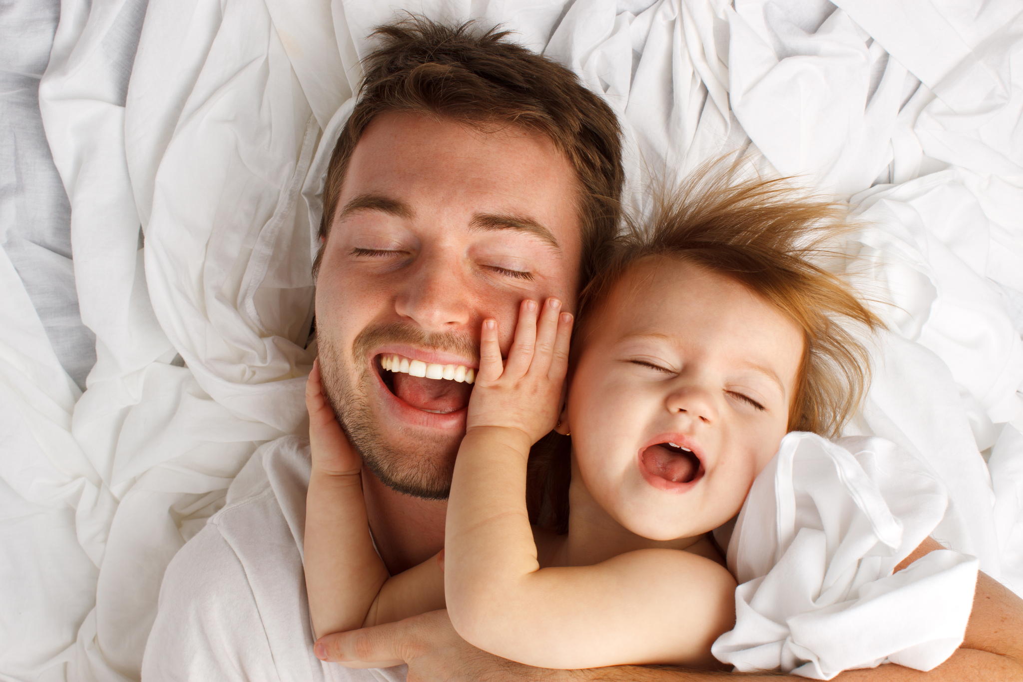 Father and daughter laughing and bonding