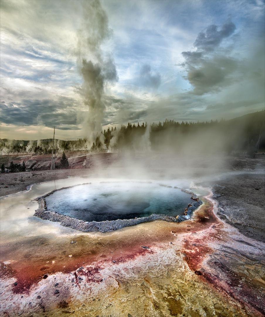 Grand Geyser erution, geothermal basin and pool near Old Faithful area, Yellowstone National Park