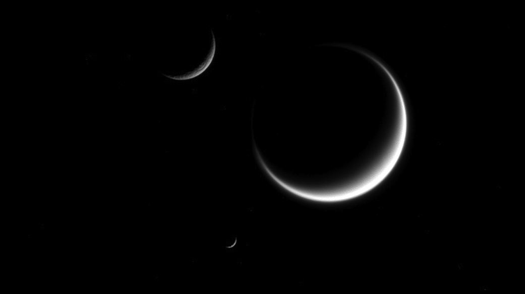 NASA's Cassini Captured Three Crescent Moons at Once from Saturn