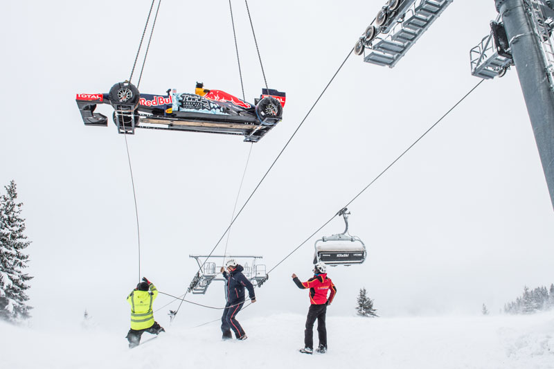 The F1 Race Car gets a lift to the start of the Showrun at the Hahnenkamm in Kitzbuehel, Austria on Jannuary 12, 2016.