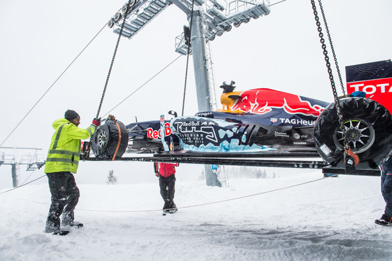 The F1 Race Car gets a lift to the start of the Showrun at the Hahnenkamm in Kitzbuehel, Austria on Jannuary 12, 2016.