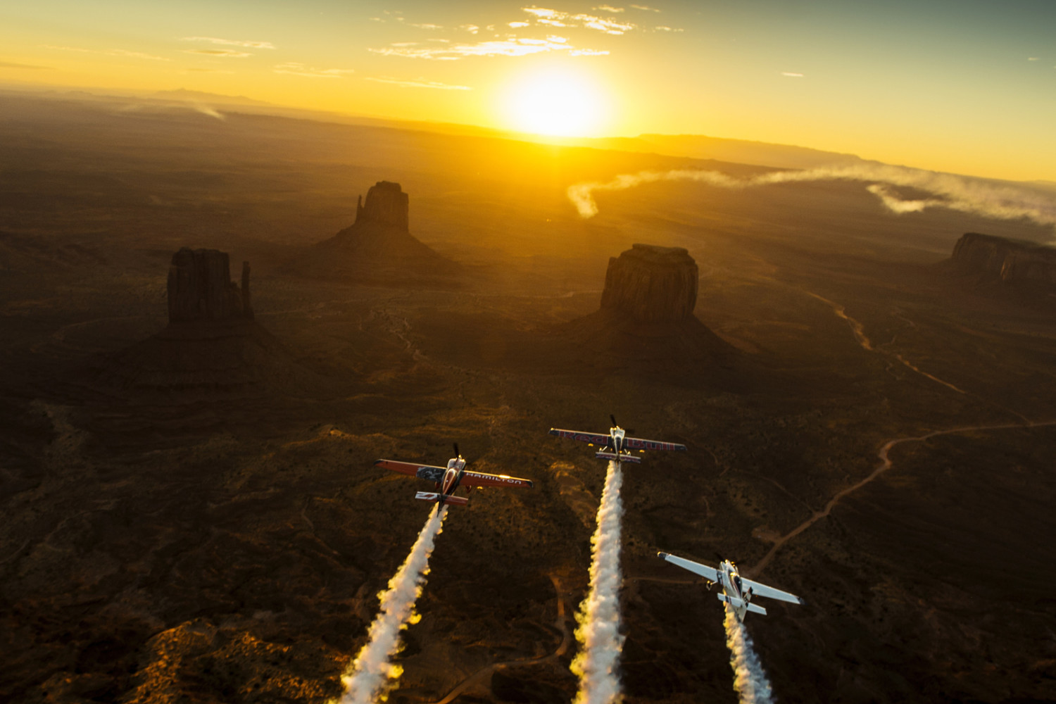 Pilots Fly Over Monument Valley in Epic Sunset Photo
