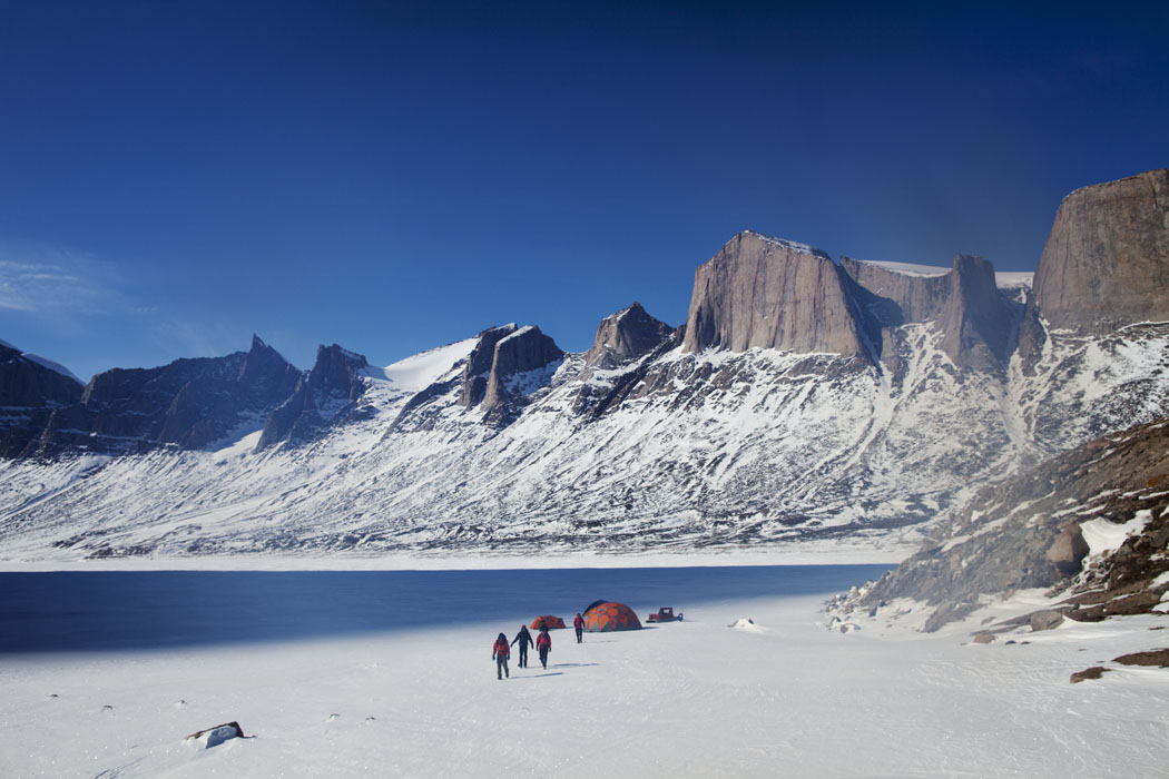 A small team of BASE jumpers leave their temporary campsite in Stewart Valley in pursuit of discovering a brand new BASE jump site on Baffin Island.