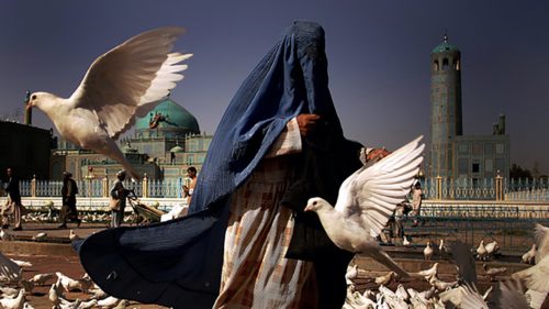 Figure draped in fabric in Afghanistan