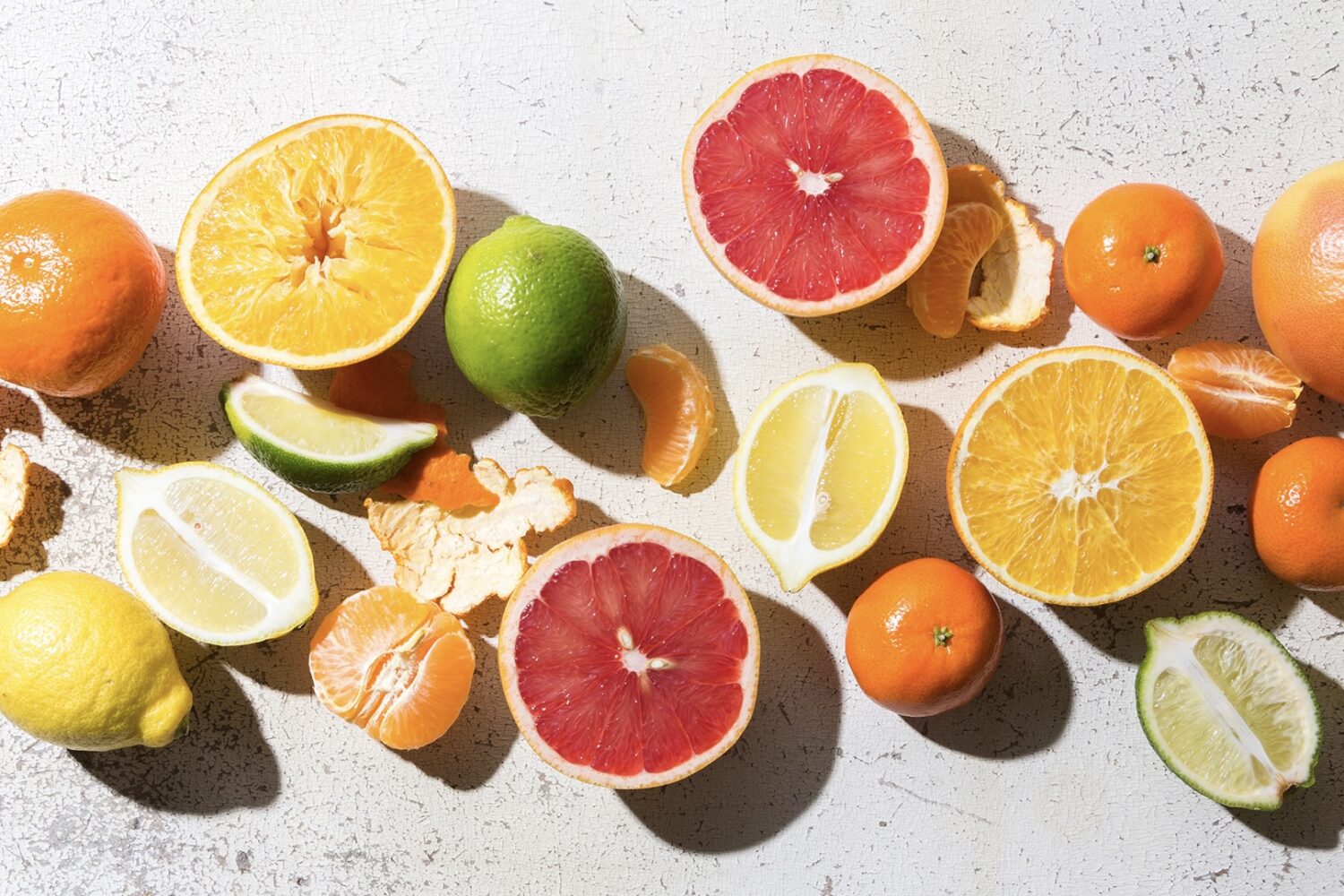 different kinds of citrus on white background By Eight Eight 2