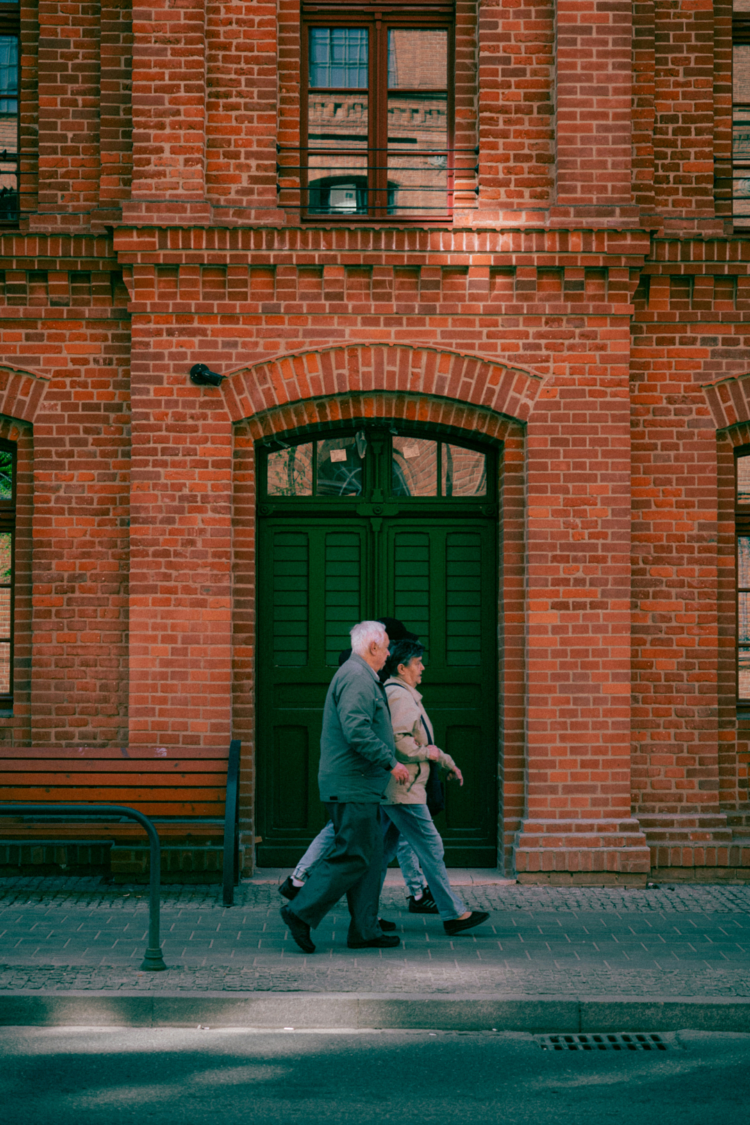 Elderly Couple Green Door