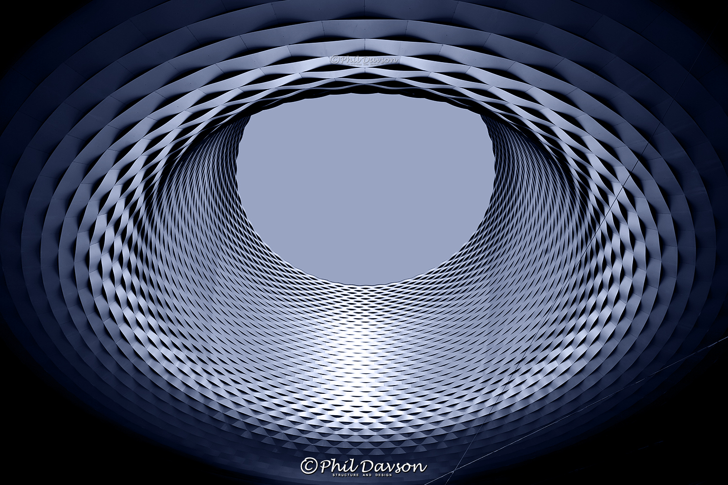 High-contrast black and white architectural spiral design captured by Phil Dawson photographer.